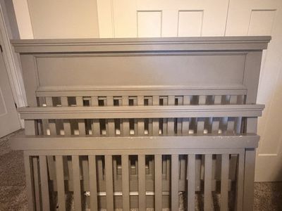 Gray Wooden Baby Crib with Slat Design
