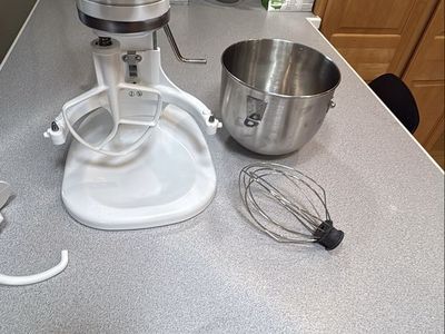 White KitchenAid Heavy Duty Stand Mixer with Bowl and Attachments