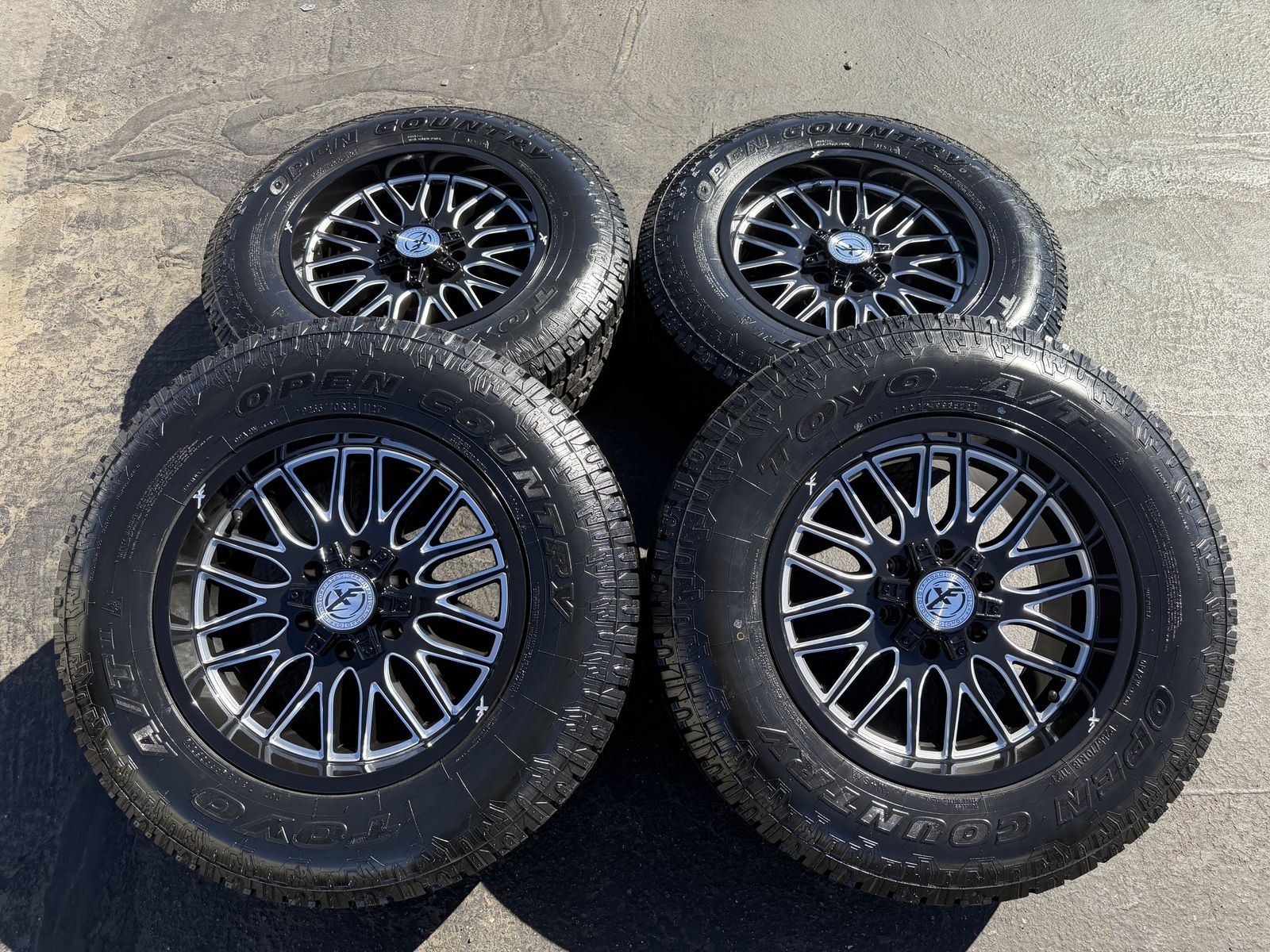 18" XF Offroad 6 Lug 6x135 6x5.5 32 Toyo 255/70R18