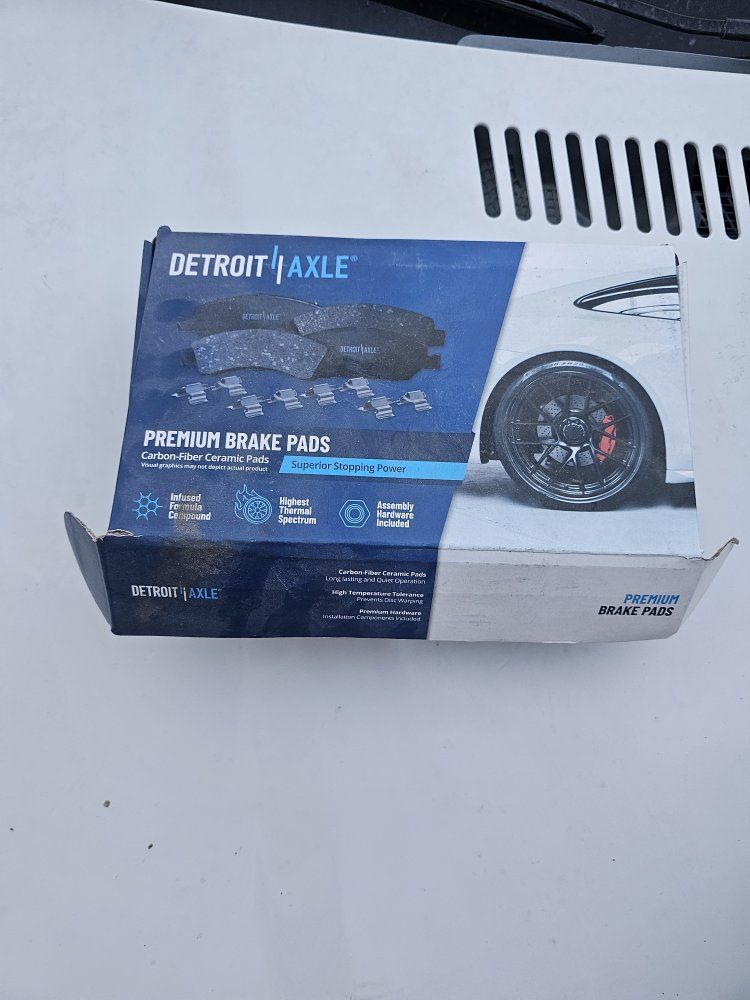 2006 Chevrolet Silverado 2500HD Duramax rear brake pads with hardware and grease