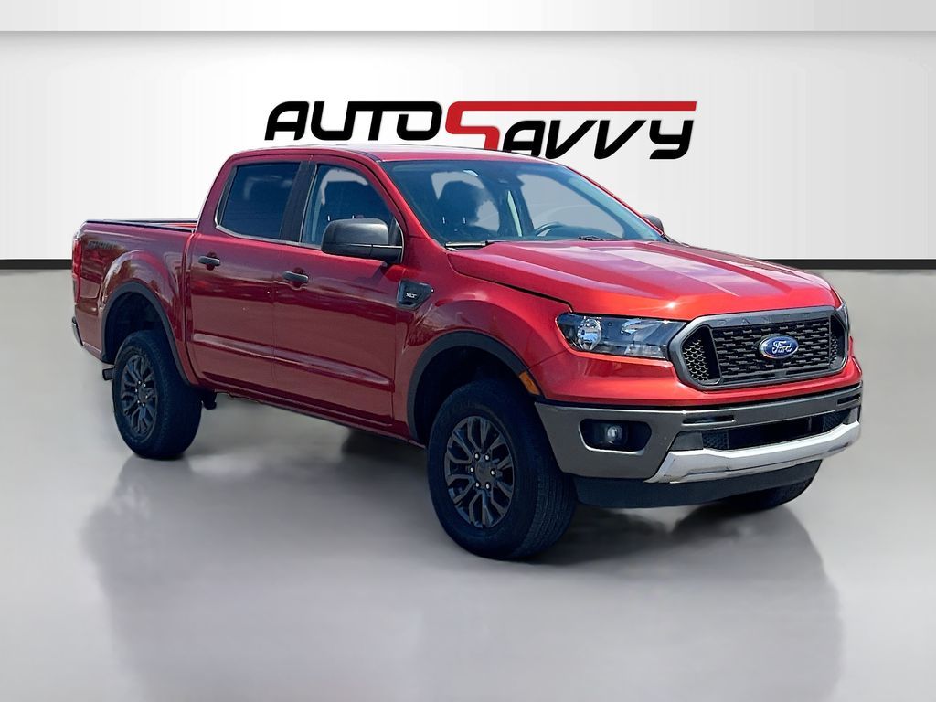 2023 Ford Ranger XLT — rebuilt & branded title, 4% below market