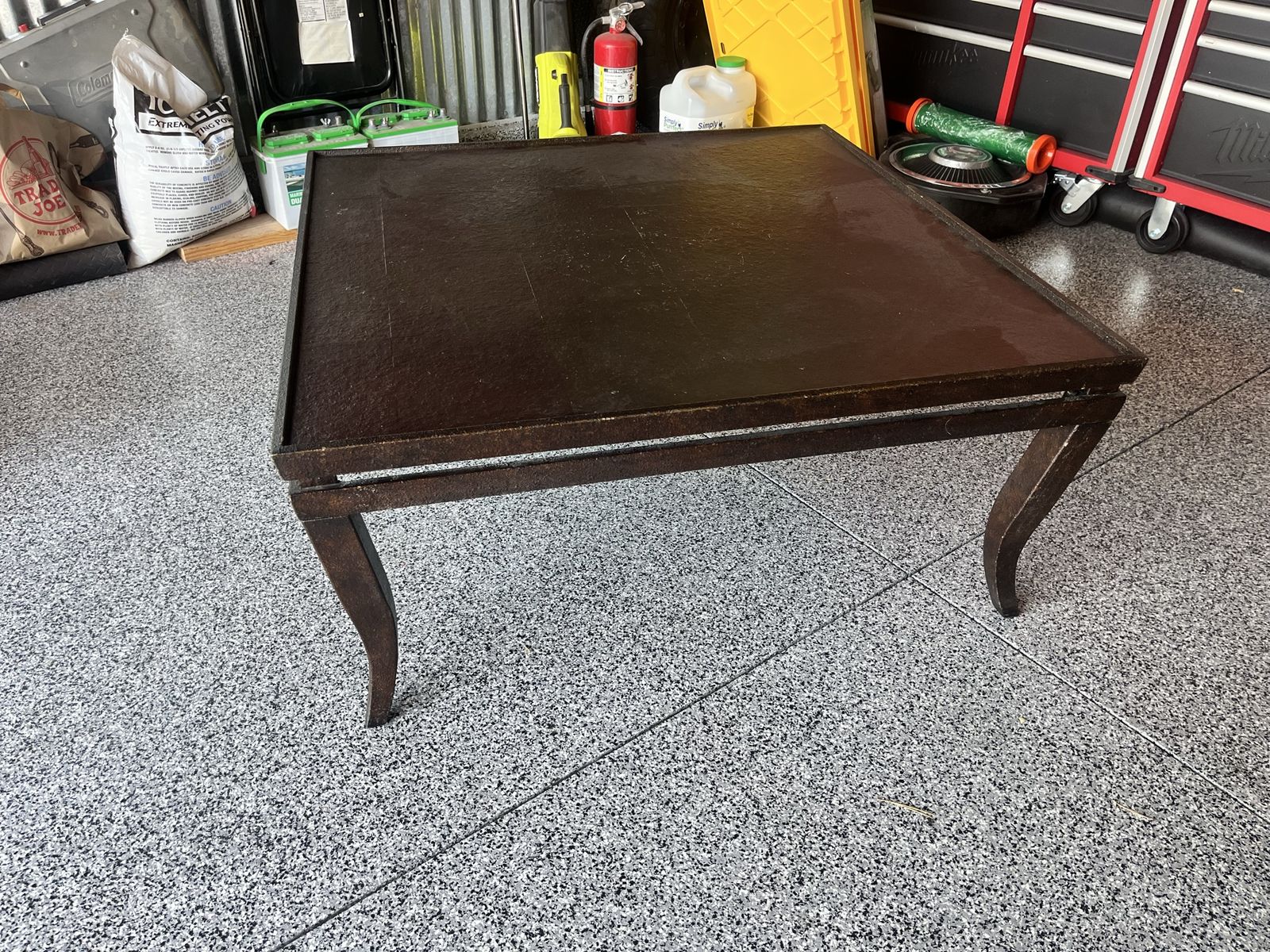 Brown/Bronzed coffee table.  40” X 40”.  Very sturdy , great shape.