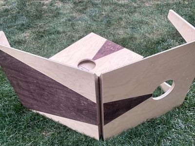 Folding cornhole set