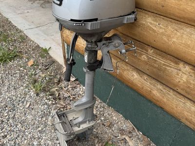 Honda 2.3 HP Outboard with removable reverse rock guard. excellent condition!