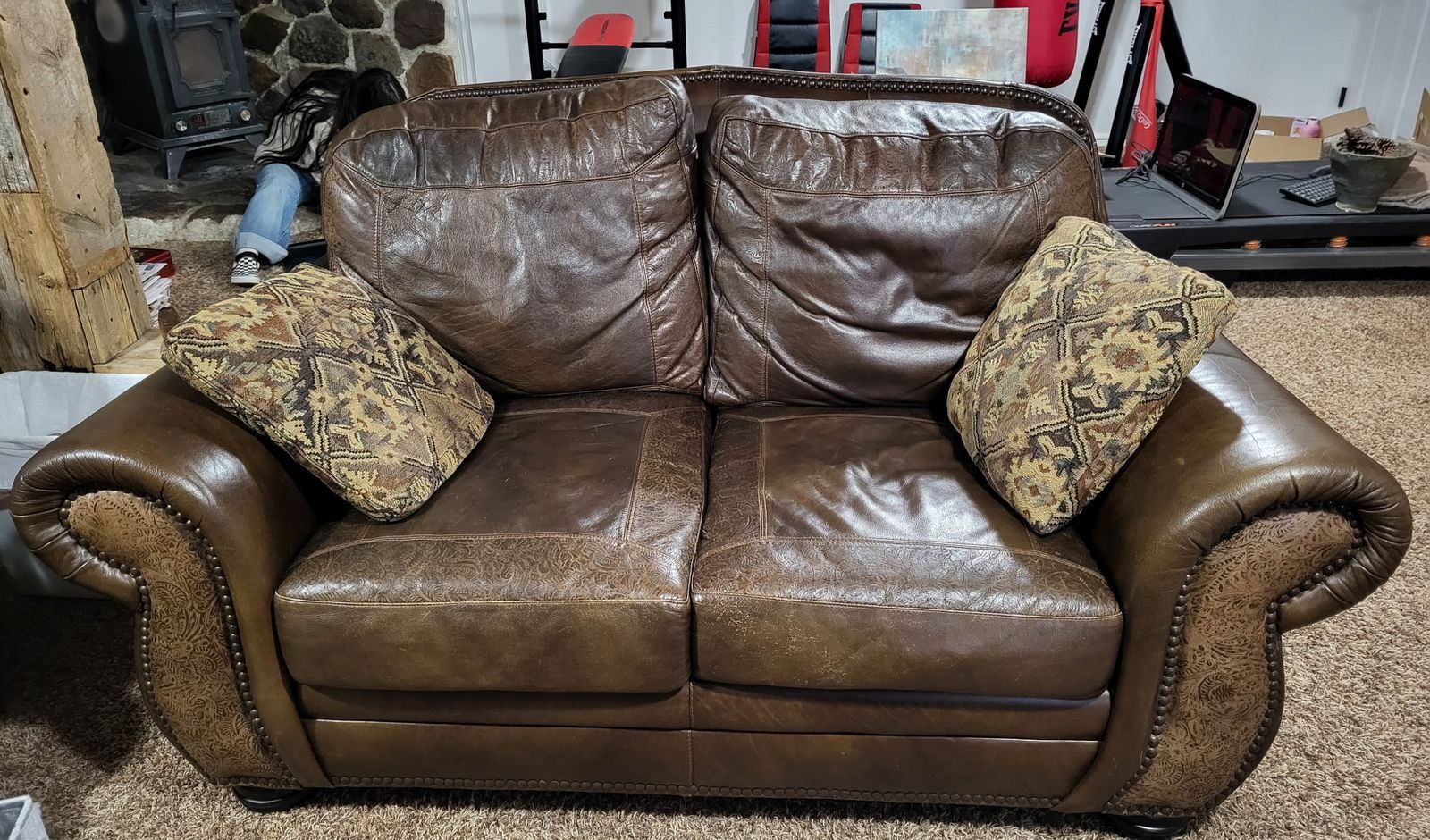 Two brown couches