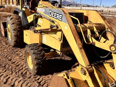 2007 John Deere 210LE skip loader