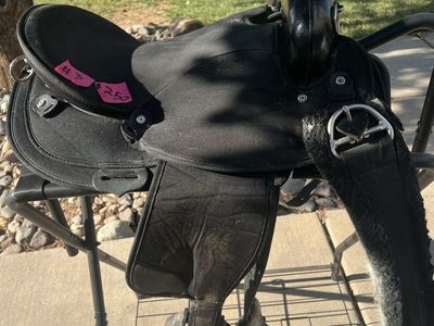 For sale, a lightweight sixteen inch endurance saddle in good used condition.