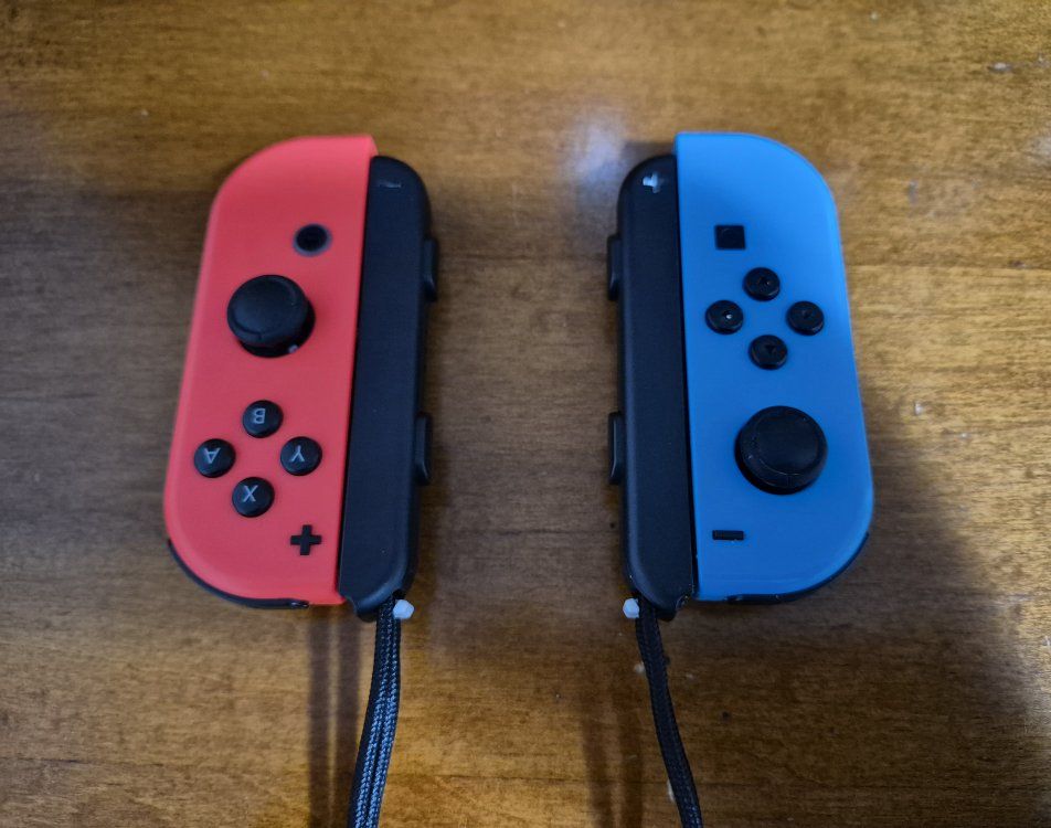 Nintendo Joy-Con Video Game Controllers with Straps for Nintendo Switch, Neon Blue/Red (HAC-015/16)