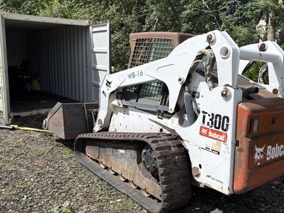 Bobcast Skidsteer T 300 and Backhoe Attachment