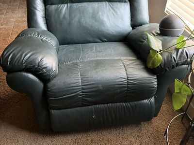 Dark Green large over stuffed Leather rocker recliner