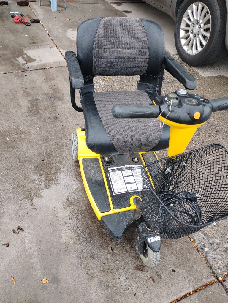 Yellow Mobility Scooter with Front Basket and Padded Seat