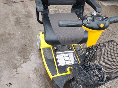 Yellow Mobility Scooter with Front Basket and Padded Seat