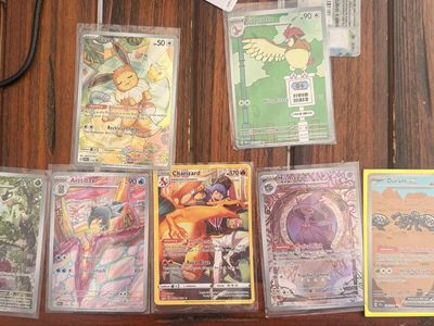 Pokémon TCG Lot: Charizard, Eevee, Floragato, Arctibax, Mismagius, Durant ex, Pidgeotto Holo Cards