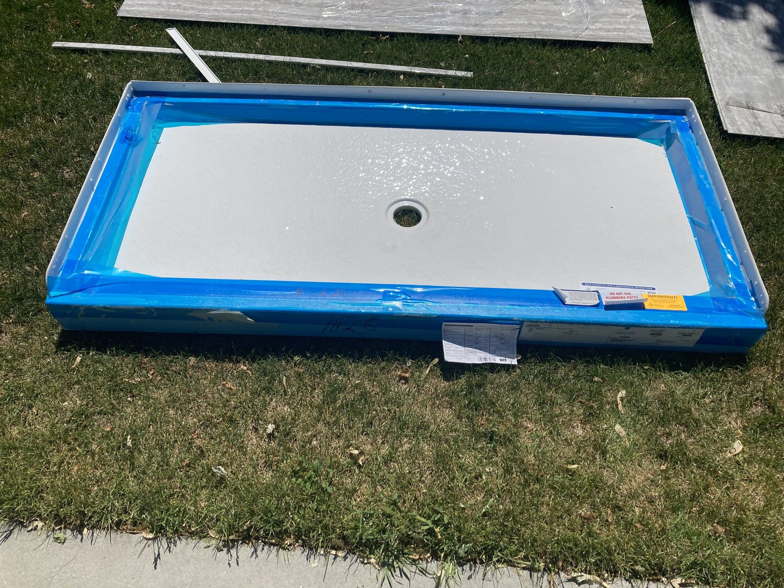 New shower pan and enclosure - marble quartz