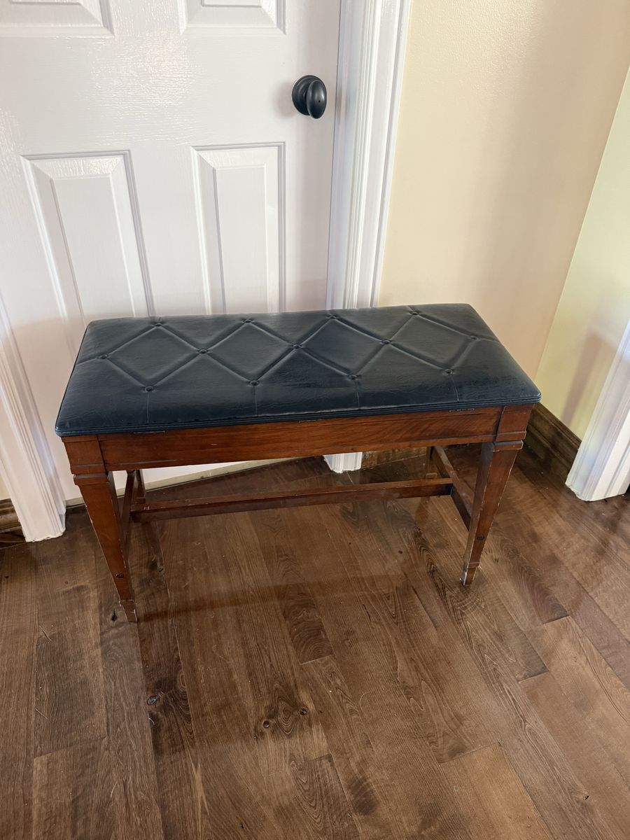 Large wood piano bench with padded top opens up for storage 32” wide 22 1/2 long 15” deep