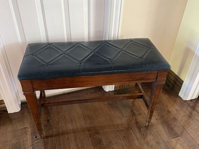 Large wood piano bench with padded top opens up for storage 32” wide 22 1/2 long 15” deep