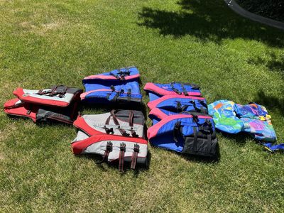 Life jackets for the whole fam damily! 1 lg, 2 med, 2 small, 1 toddler. Americas Cup high quality. $20 ea obo.