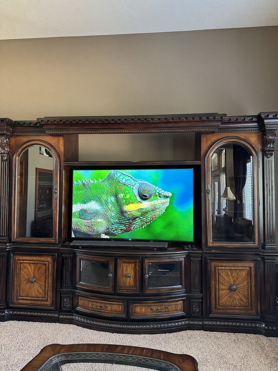 Large Dark Wood Entertainment Center, TV, Soundbar with Sub, Cocktail Table