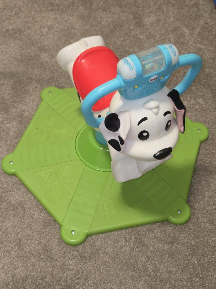Fisher-Price Bounce and Spin Puppy Interactive Ride-On Toy