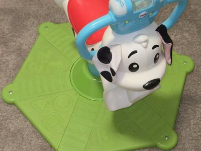 Fisher-Price Bounce and Spin Puppy Interactive Ride-On Toy
