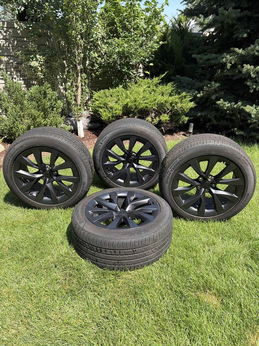 Staggered OEM set of 4 Tesla Model X 20" Black Slipstream Wheels with Continental CrossContact LX Sport Tires. New condition.