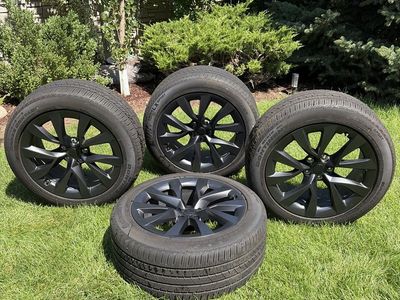Staggered OEM set of 4 Tesla Model X 20" Black Slipstream Wheels with Continental CrossContact LX Sport Tires. New condition.
