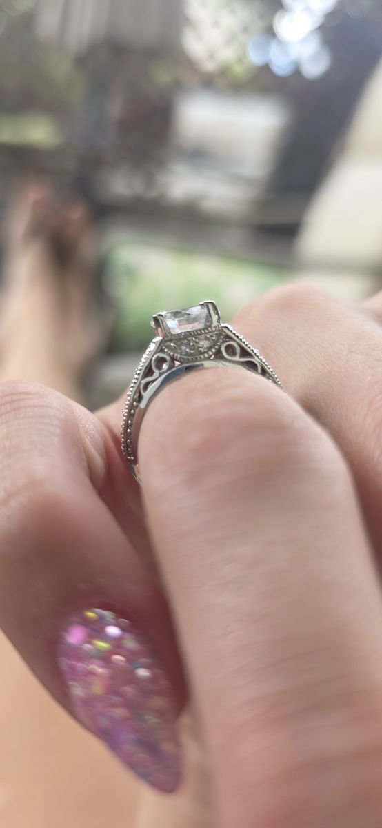 Elegant Silver-Toned Statement Ring with Large Round Center Stone and Intricate Band Design