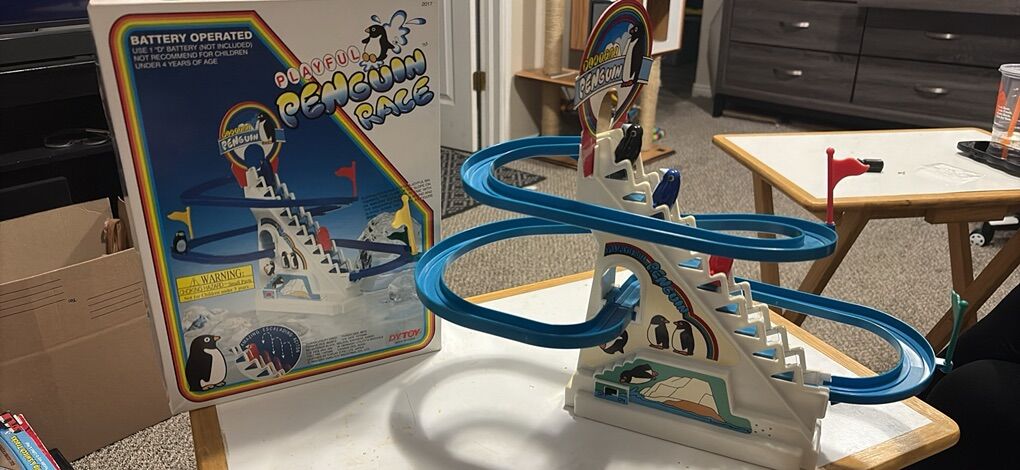 VIntage Playful Penguin Race 1983