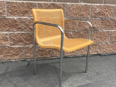 Mid Century Curved Chrome & Cane Chair