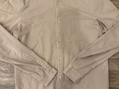 Tan Lululemon long sleeve button up shirt