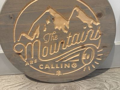 Rustic Wooden “The Mountains Are Calling” Wall Sign – 14.5”