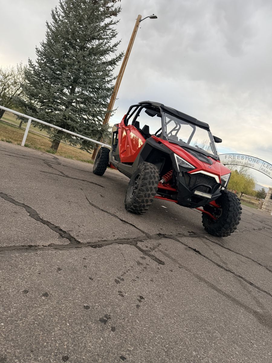 Polaris RZR Pro XP Side-by-Side UTV - Red includes trailer and paddles 