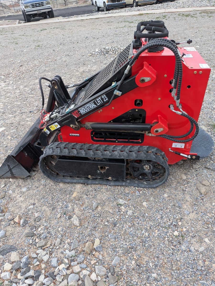 Mini skid steer for rent. 801-505-1213