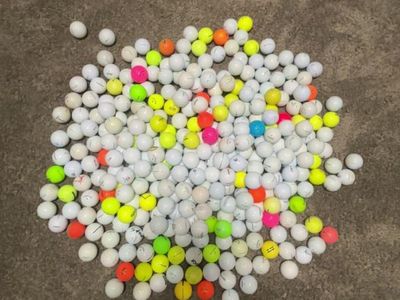large variety of golf balls $.50 a peice