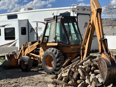 Case 580D-Enclosed Cab/Heater