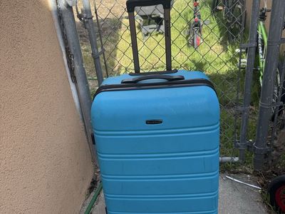 Rockland blue hard sheel luggage 29” Tall