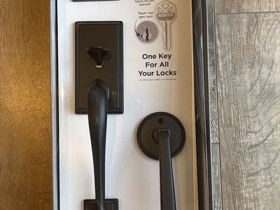 NEW Kwikset Amador Matte Black Entry Door Handleset with Round Rose Hollis Handle