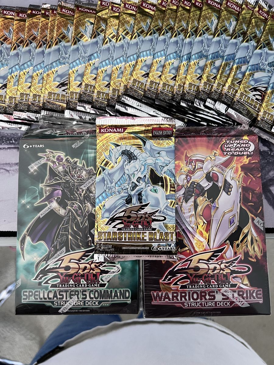 Vintage Yu-Gi-Oh packs (Starstrike Blast) and two structure decks (sealed)