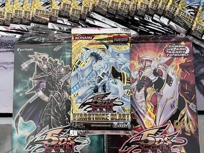 Vintage Yu-Gi-Oh packs (Starstrike Blast) and two structure decks (sealed)