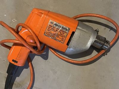 vintage black and decker drill (orange)