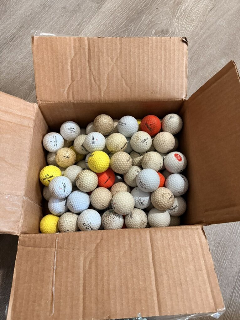 Golf Balls And Golf Tees