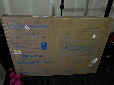 Brand new, slightly damaged Davinci Crib