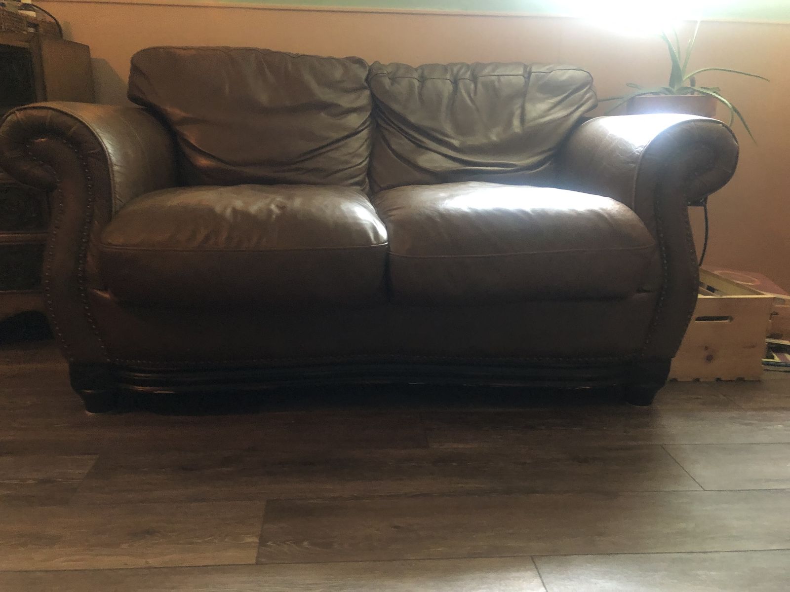 Beautiful high end brown leather couch (love seat)