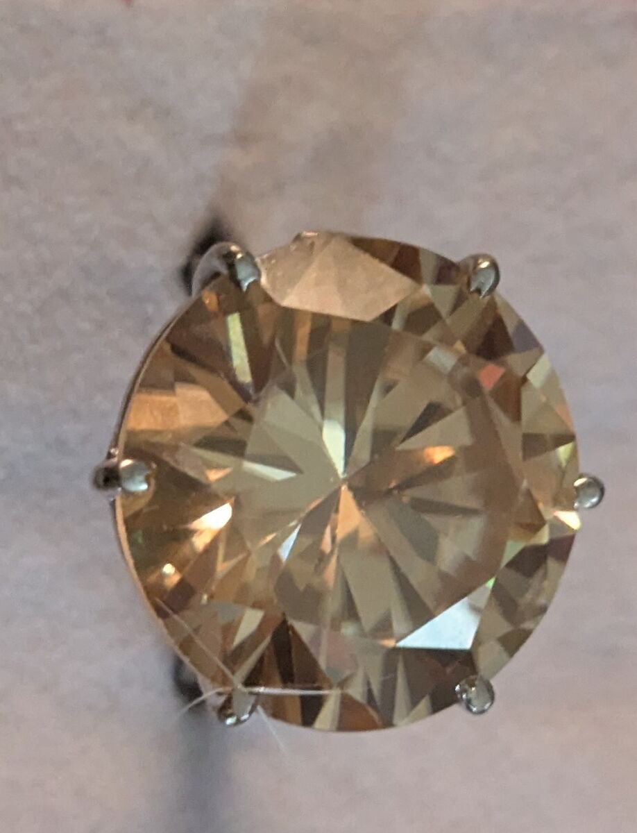 27.10 ct champagne round Earth mined HTPT diamond ring