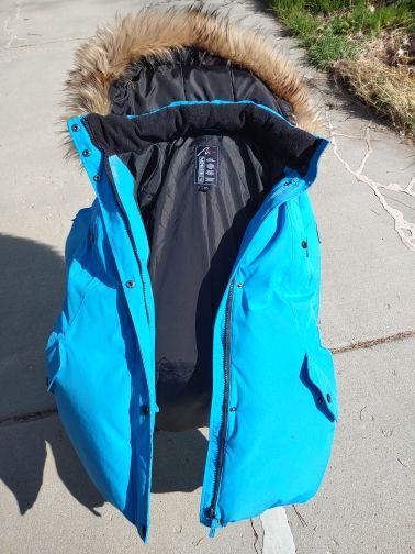 Extreme Cold-Weather Coat: features a durable water-repellent coating, reflective elements, dense down-and-feather