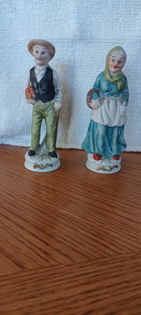 Hummel style figurines grandma and grandpa