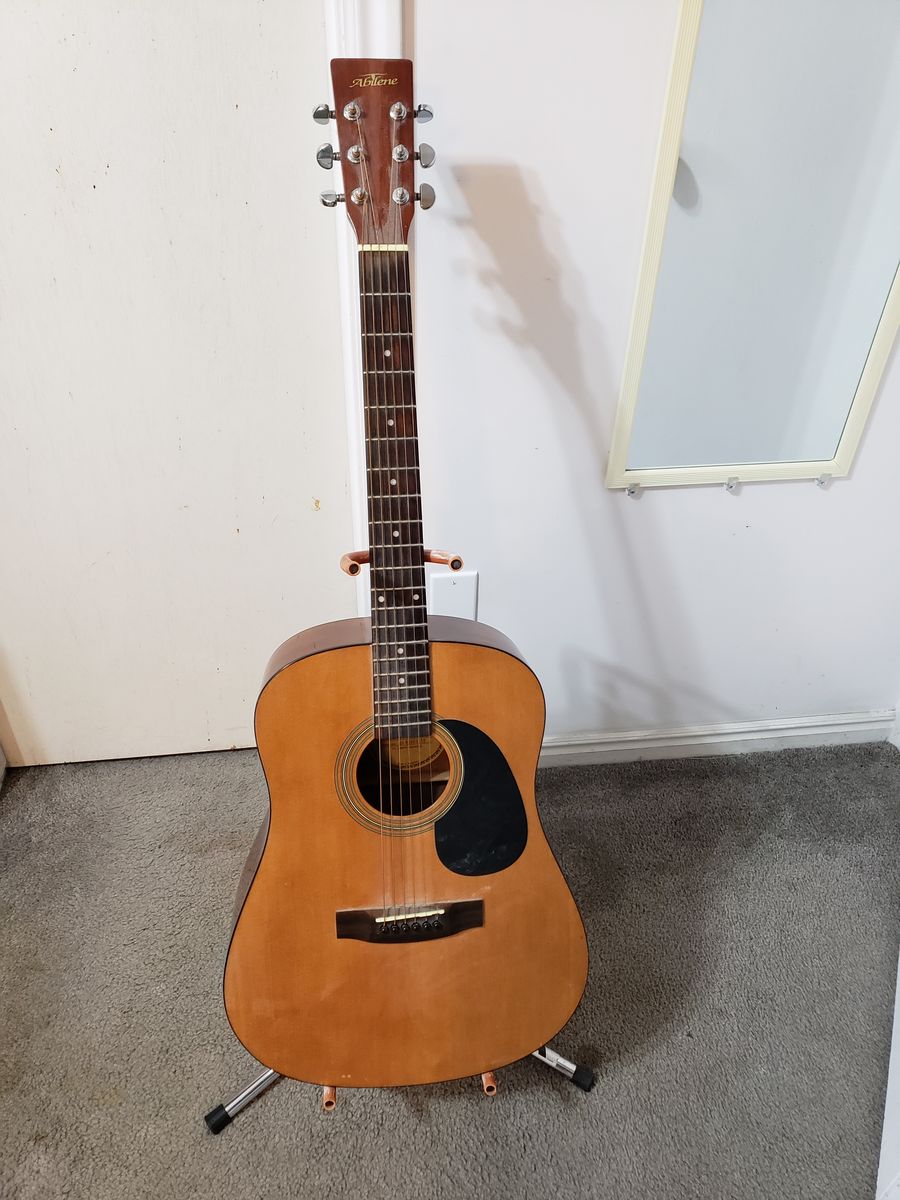 Abilene acoustic guitar with stand