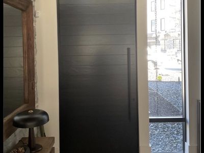 Loewen Custom Accoya Wood Inswing Pivot Front Entry Door 52.5" x 105.75" Midnight Bronze Clad