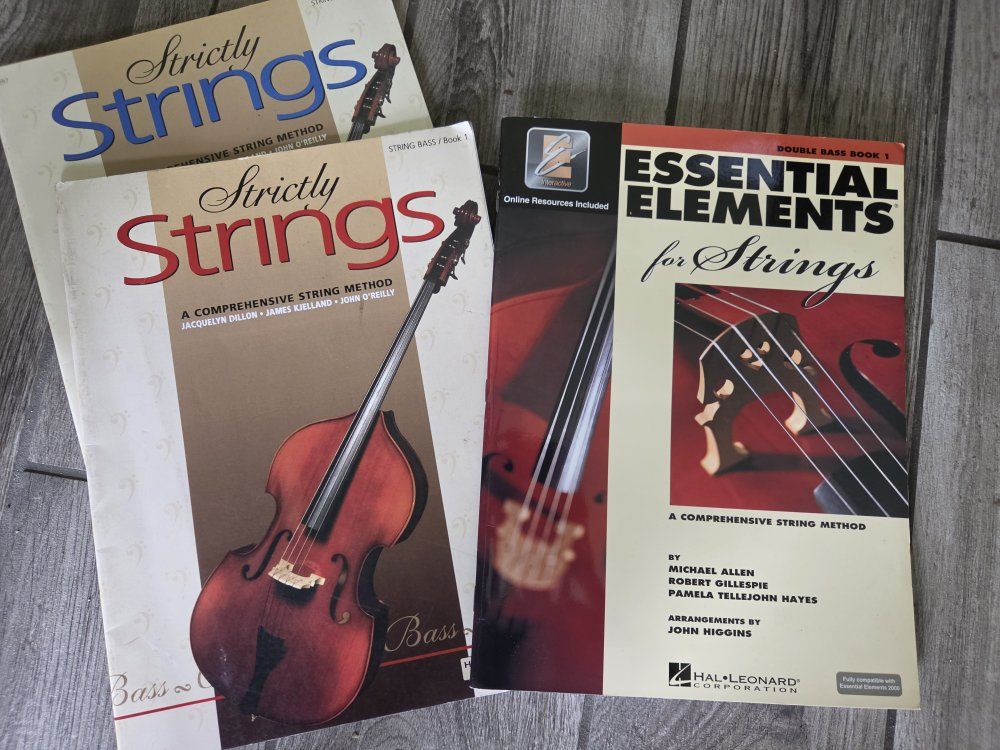 Assorted Music Instruction Books and Jimmy Buffett Sheet Music Anthology