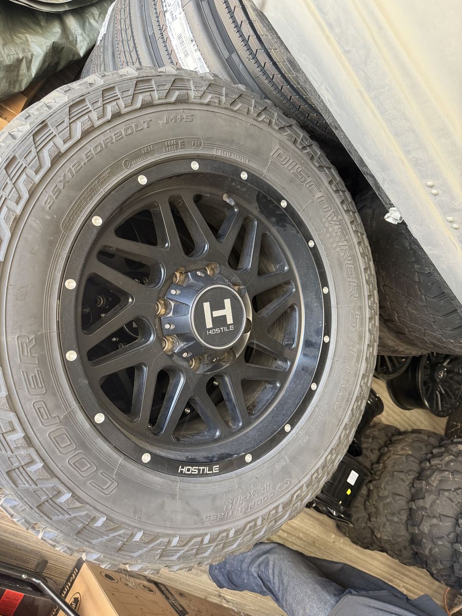Hostile 20 x 9 (8-180) wheels with 35 x 12.50 Cooper Tires